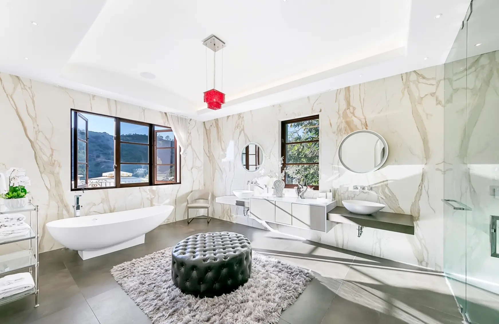 Elegant spa-style bathroom with freestanding tub and marble walls at a Los Angeles luxury mental health and wellness retreat