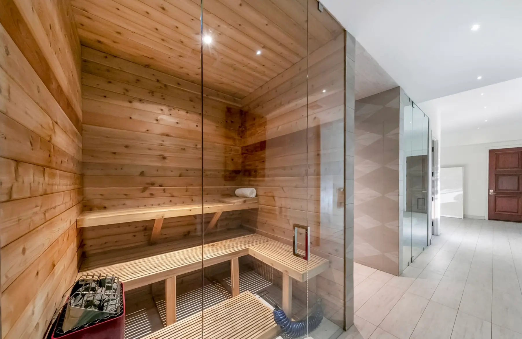 Private wooden sauna with glass enclosure at a Los Angeles luxury mental health and wellness retreat