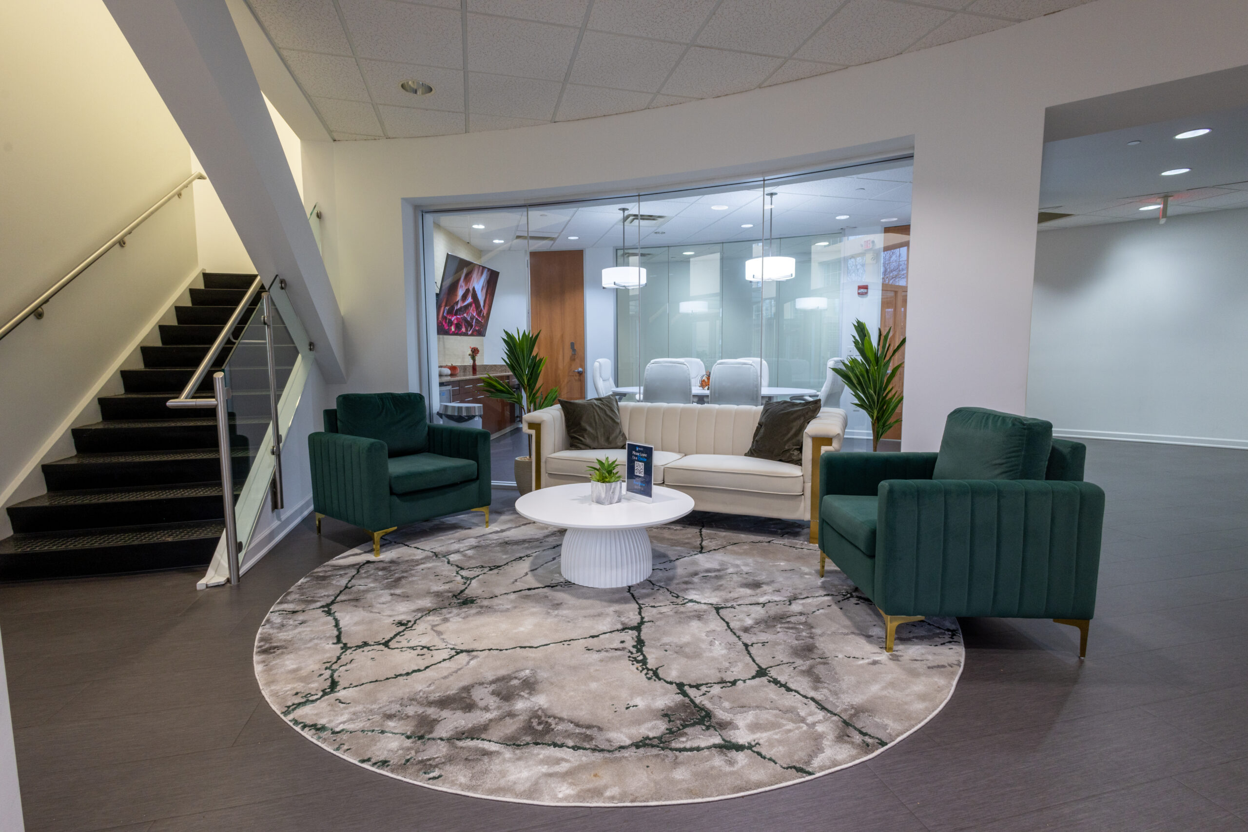 The image depicts a serene modern outpatient rehabilitation facility featuring a comfortable indoor seating area surrounded by modern accents, providing a tranquil environment for patients recovering from various conditions. This space is designed to enhance well-being and support therapy programs, fostering a sense of community and relaxation for individuals undergoing outpatient treatment.